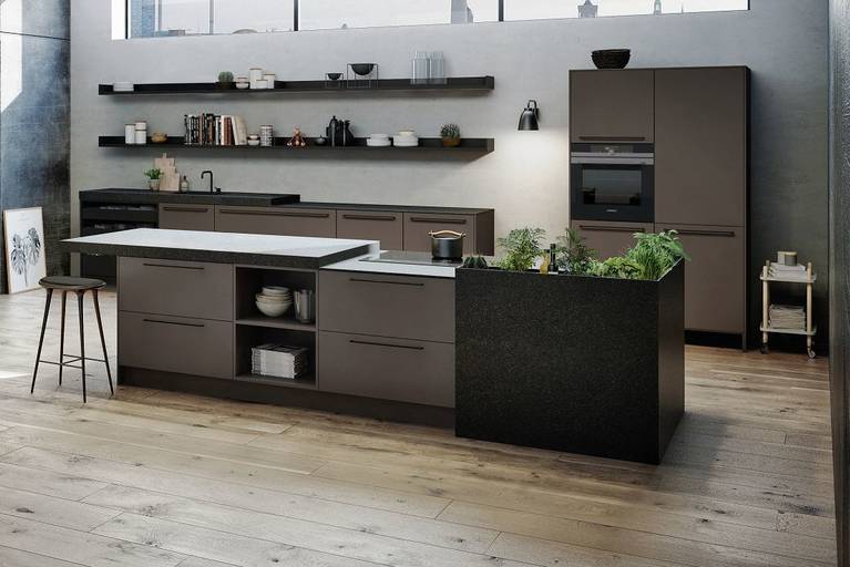 SieMatic Urban SE kitchen island in umbra with stone herb garden and breakfast bar