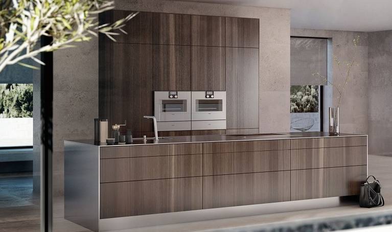 SieMatic Pure SE kitchen island in smoked oak veneer with countertop and side panels in 1 cm stainless steel