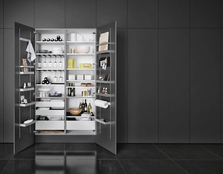 With SieMatic MultiMatic interior accessories, gain up to 30% more storage space in tall, wall and base cabinets.