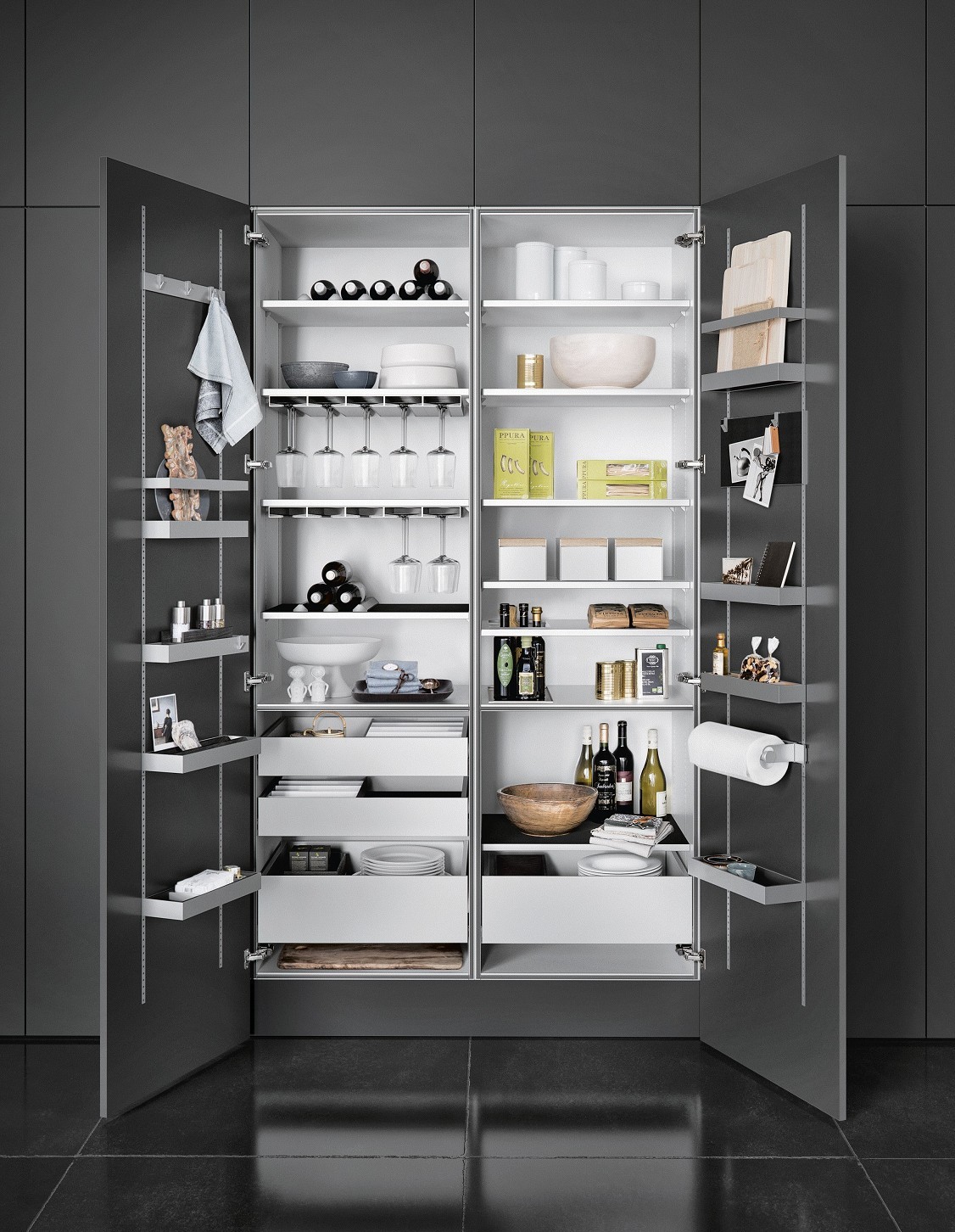 With SieMatic MultiMatic interior accessories, gain up to 30% more storage space in tall, wall and base cabinets.