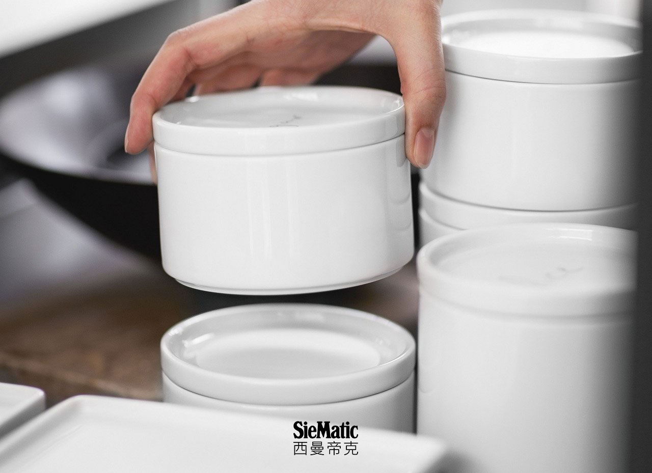 Stackable porcelain containers by SieMatic optimize storage in the kitchen