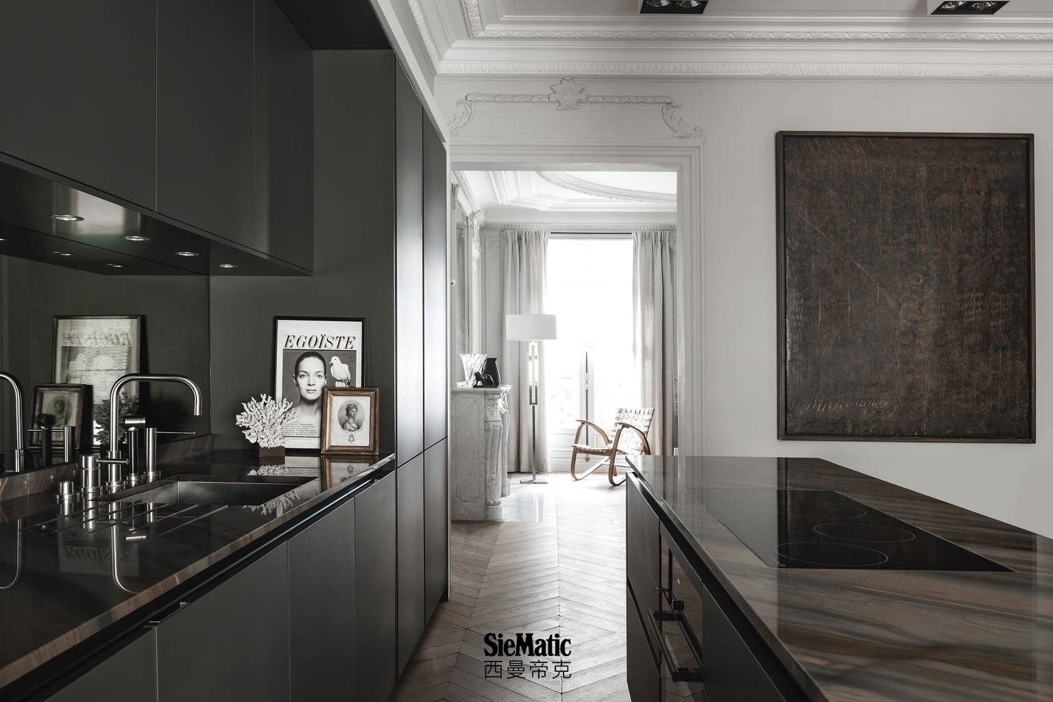 SieMatic Pure S2 kitchen cabinets and recessed handle channels in graphite grey matte lacquer with meticulous AntiPrint coating