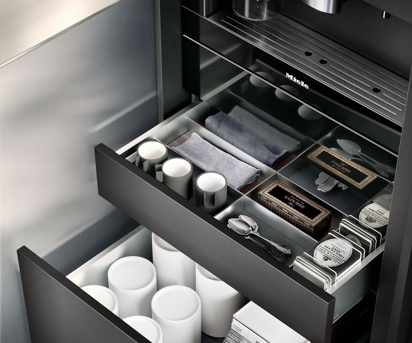 Porcelain containers and cutlery inserts from the SieMatic Aluminum Interior Accessories System for kitchen drawers
