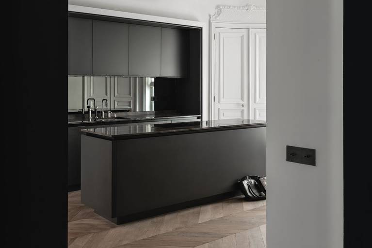 SieMatic Pure S2 kitchen island in graphite grey matte lacquer with a classic herringbone parquet wood floor