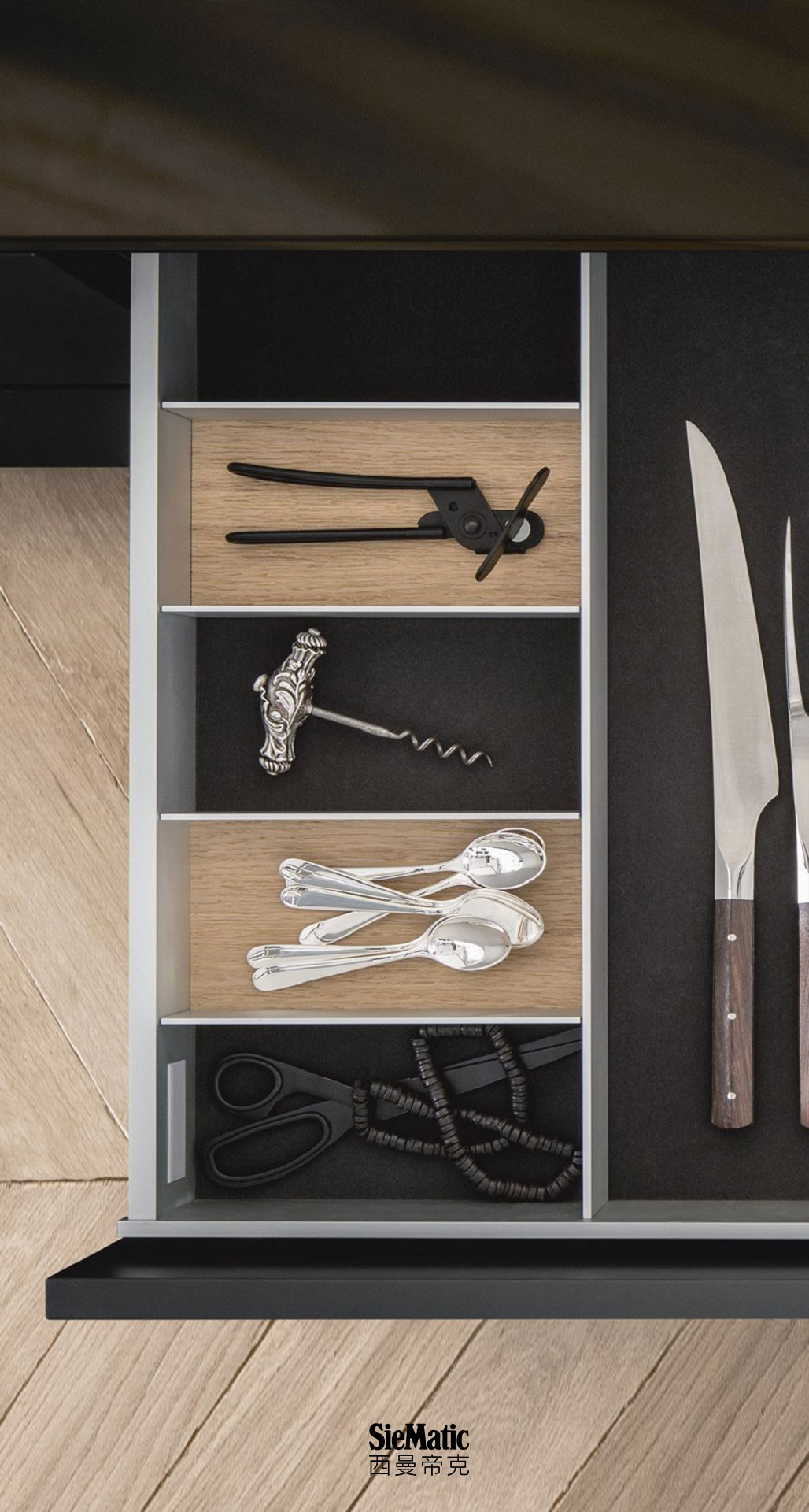 Cutlery and other functional inserts from the SieMatic Aluminum Interior Accessories System