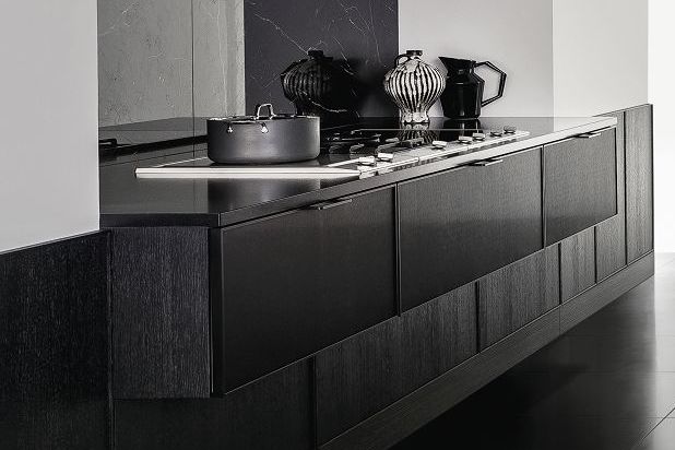 SieMatic Pure SE 3003 R kitchen with brushed metal door fronts and side panels in black matte oak