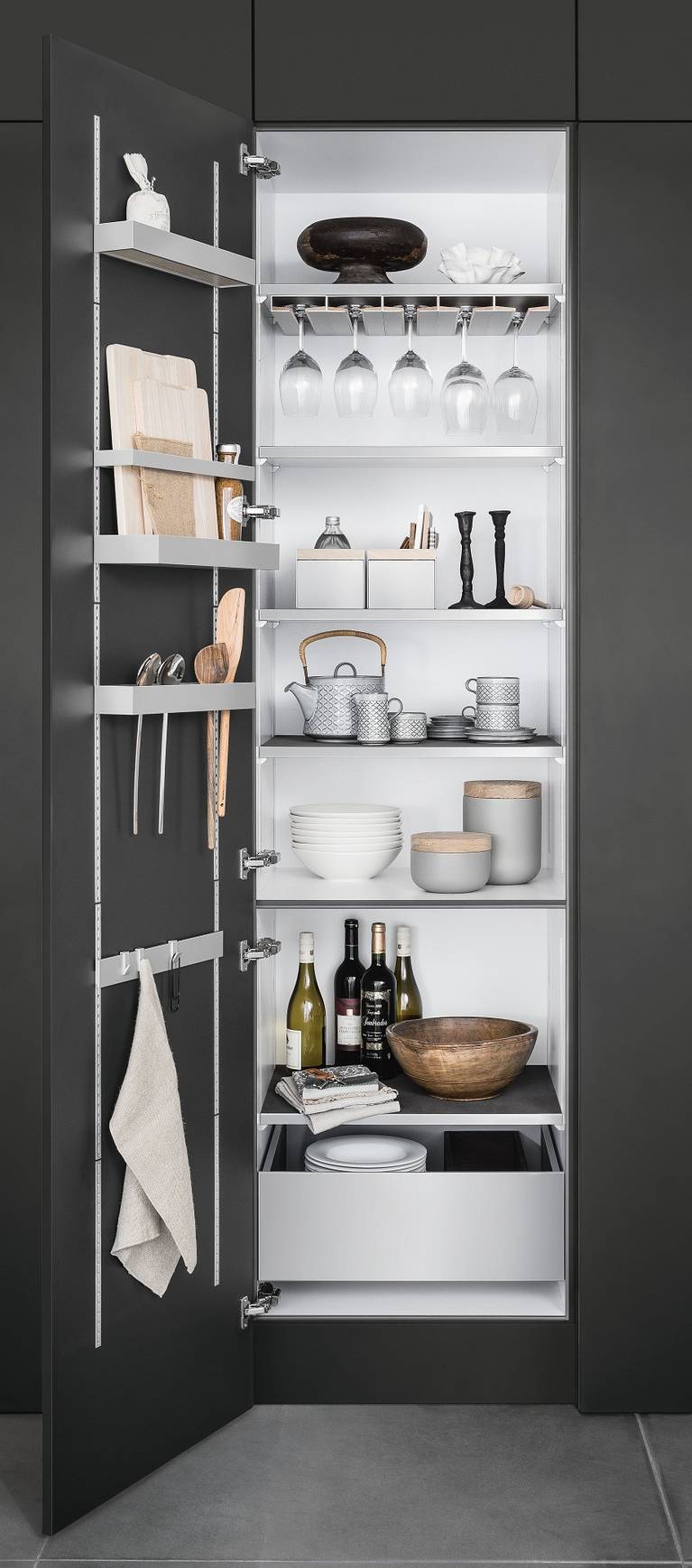 SieMatic MultiMatic interior organization system for tall cabinets offers more storage space in the kitchen.