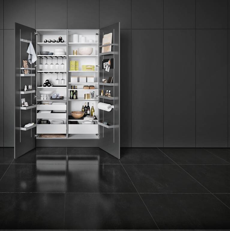 With SieMatic MultiMatic interior accessories, gain up to 30% more storage space in tall, wall and base cabinets.