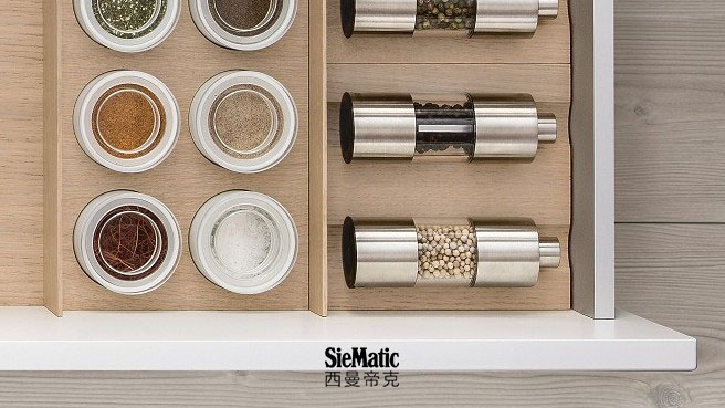 Spice jars and mills from SieMatic wooden interior accessories for the kitchen