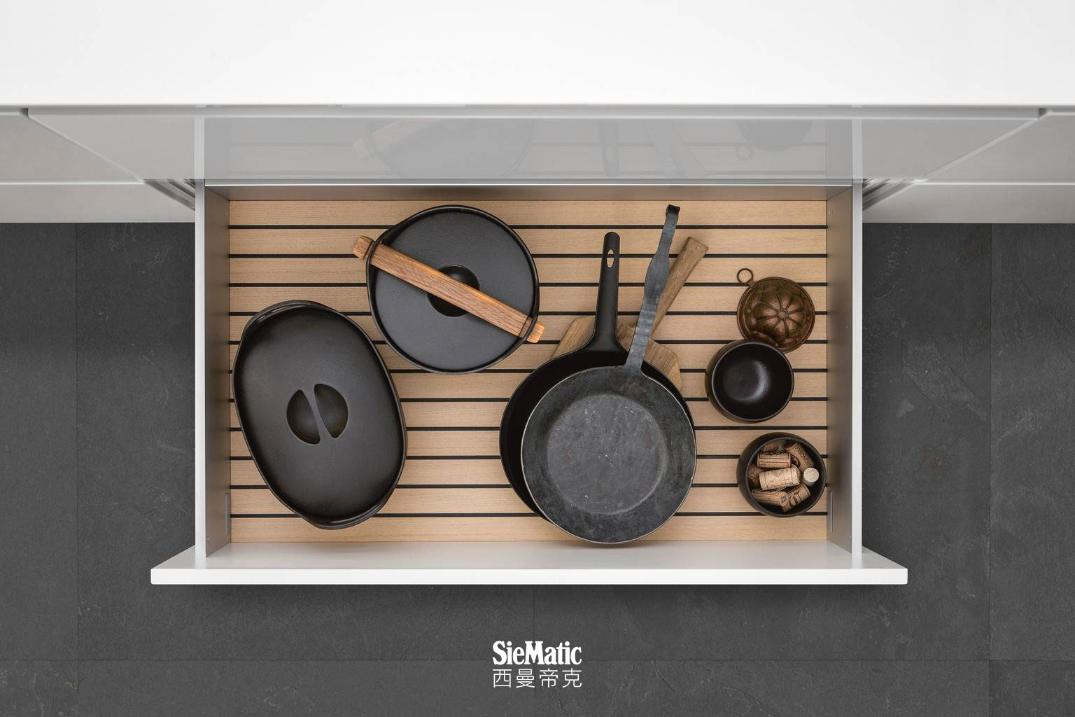 GripDeck inserts for SieMatic kitchen drawers and pull-outs prevent pots and pans from sliding.