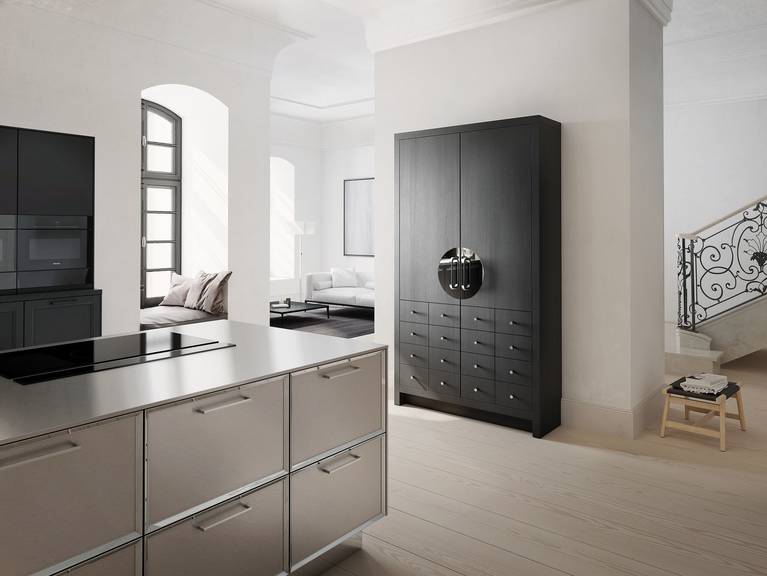 Chinese wedding cabinet from the SieMatic Classic style collection in black matte oak with polished nickel