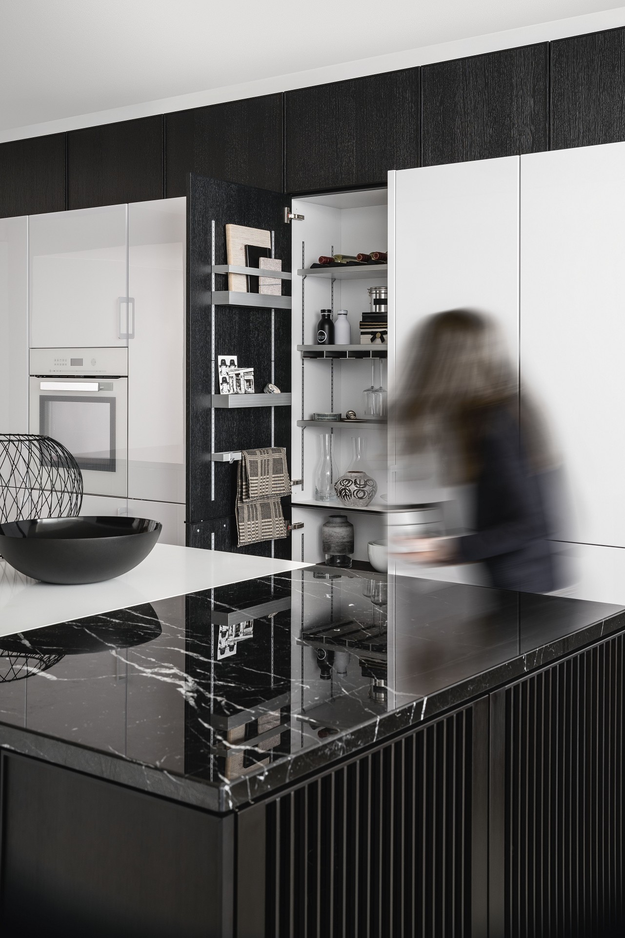 SieMatic Pure SE 3003 R kitchen cabinets in black matte oak with SieMatic MultiMatic interior organization system